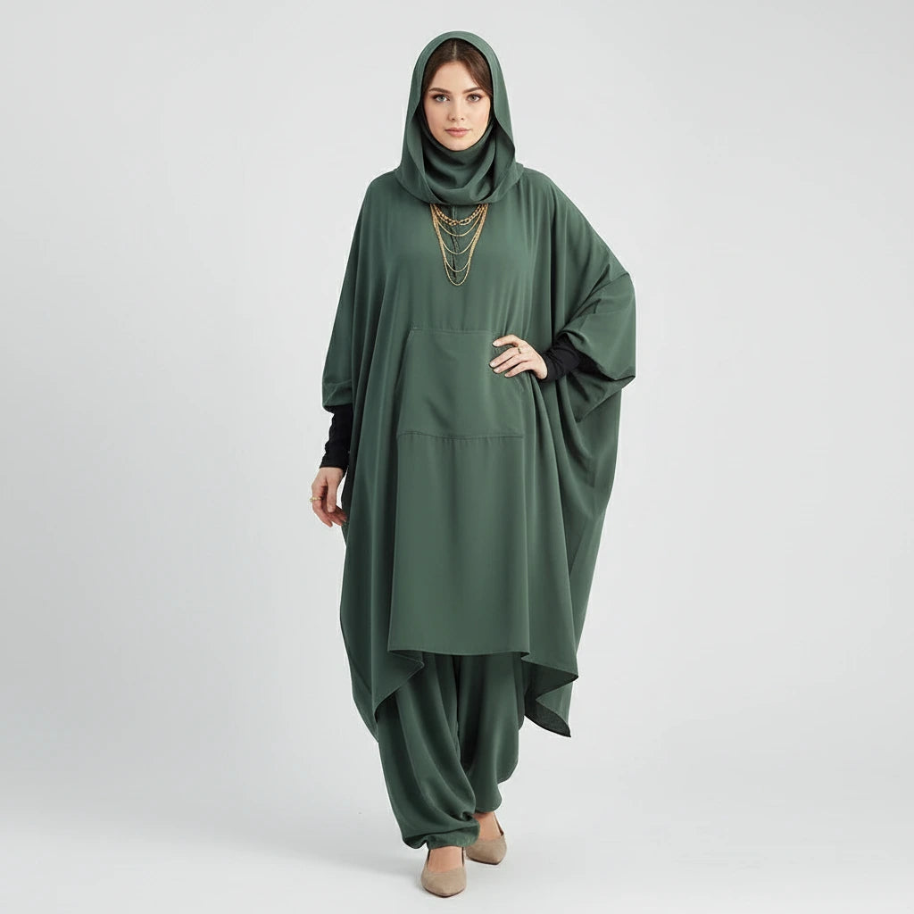 Woman wearing a green hooded outfit on a white background