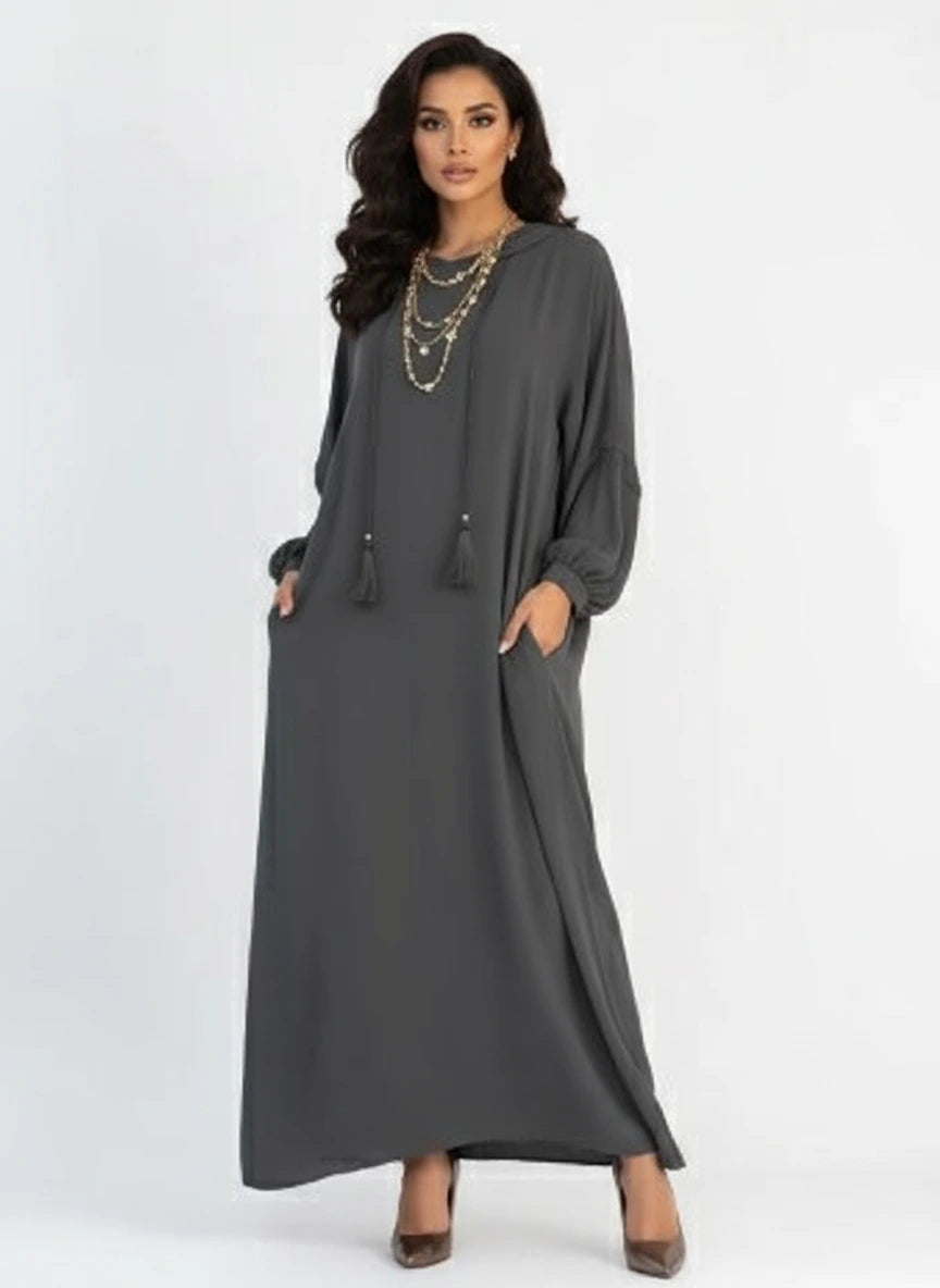 Gray dress on a mannequin against a white background