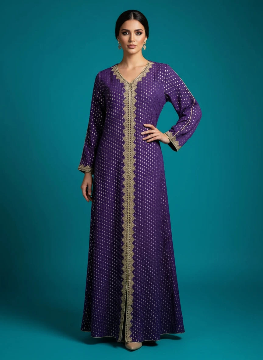 Purple dress with gold embroidery on a mannequin against a white paneled wall.