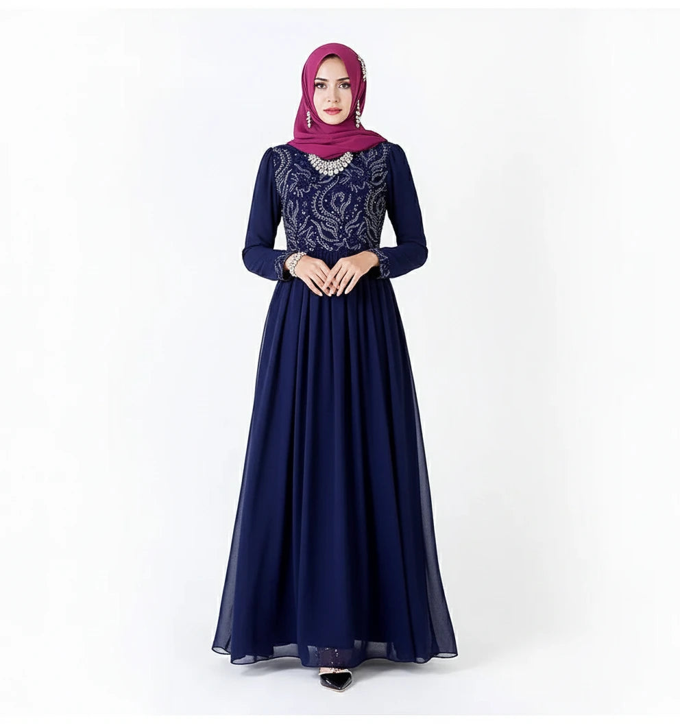 Navy blue dress with lace detailing and a pink hijab on a white background