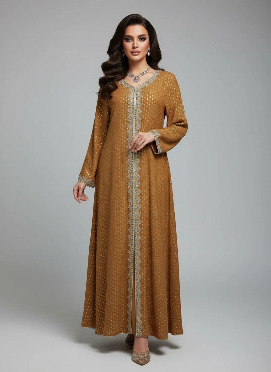 Mustard yellow dress with intricate detailing on a mannequin against a white paneled wall.