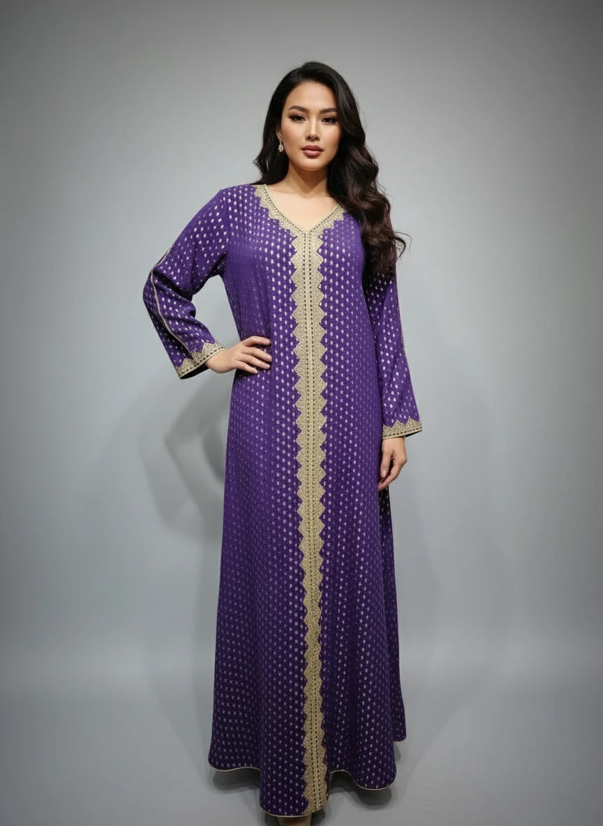 Purple dress with gold embroidery on a mannequin against a white paneled wall.