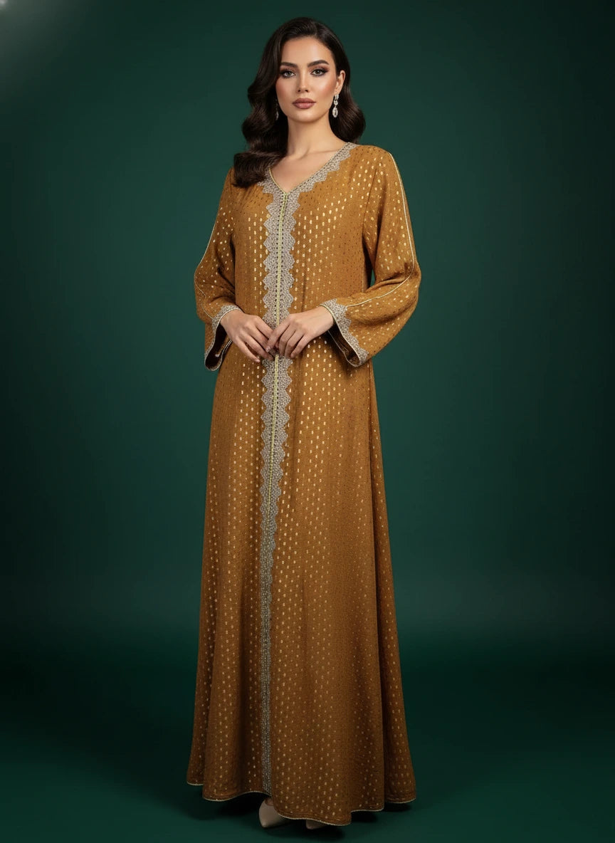 Mustard yellow dress with intricate detailing on a mannequin against a white paneled wall.